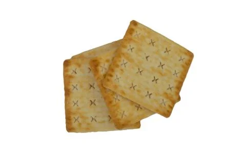 Crackers biscuits over white background. Selective focus 库存照片