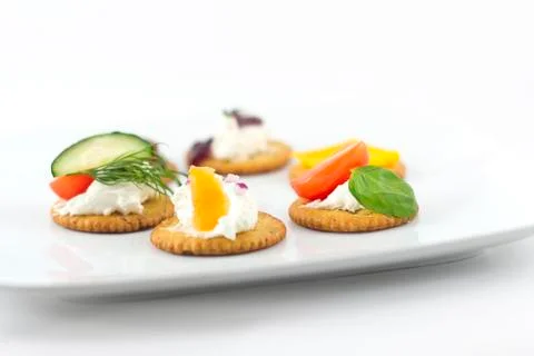 Crackers canopes with toppings Stock Photos