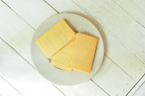 Crackers crispy cheese stuffed with pineapple on wood-table. Stock Photos