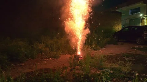 Crackers explode with joy during a village celebration Stock Footage 312723422