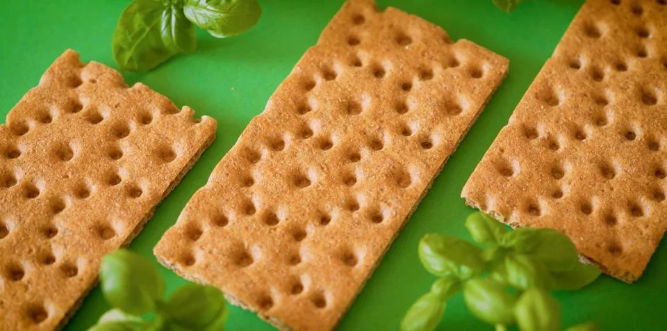 Crackers on a green background Stock Photos