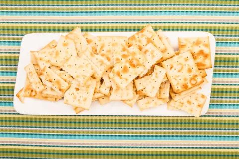 Crackers on a plate. Stock Photos