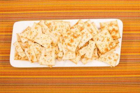 Crackers on a plate. Stock Photos