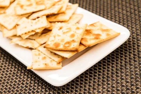 Crackers on a plate. Stock Photos