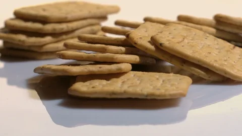 Crackers rotate on white background Stock Footage 104144015