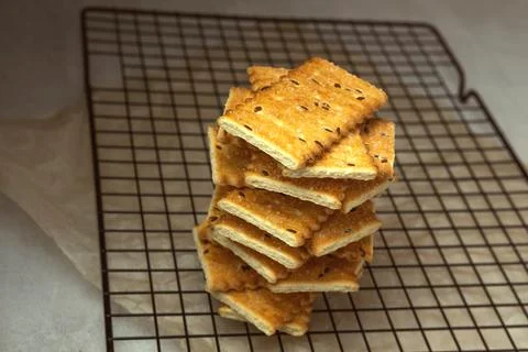 Crackers with seeds on the grill Stock Photos
