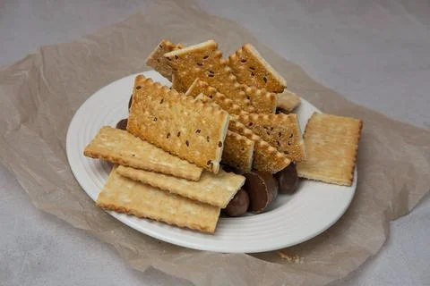Crackers with seeds on the grill Stock Photos