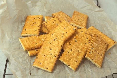 Crackers with seeds on the grill Stock Photos