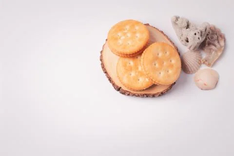 Crackers with shells on a white background Foto stock