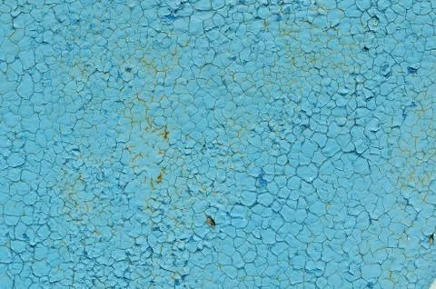 Cracking and peeling paint on a wall Stock Photos