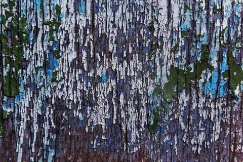 Cracking and peeling paint on a wall Foto stock