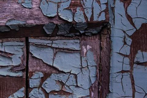 Cracking and peeling paint on a wall Stock Photos