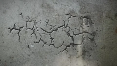 Cracking Concrete Wall with Falling Debris and Dust Earthquake Damage Animation  Stock Footage 339285522