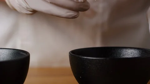 Cracking egg into bowl macro shot, preparing ingredients for Tar Tar Stock-Footage 128488267