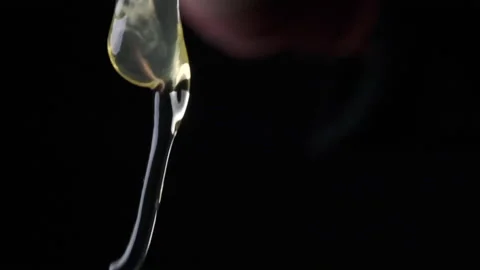 Cracking egg egg yolk falling slow motion  Stock Footage 169238524