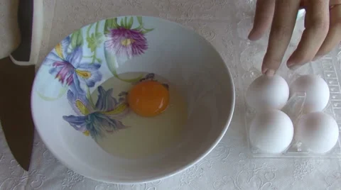 Cracking an egg Stock Footage 53817239