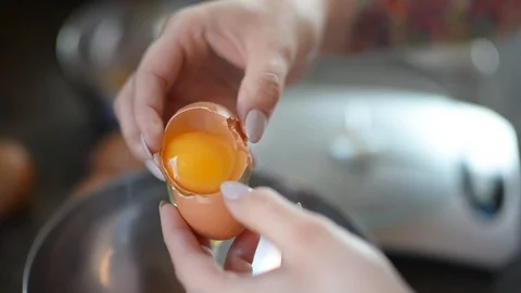 Cracking an egg Stock Footage 105245050
