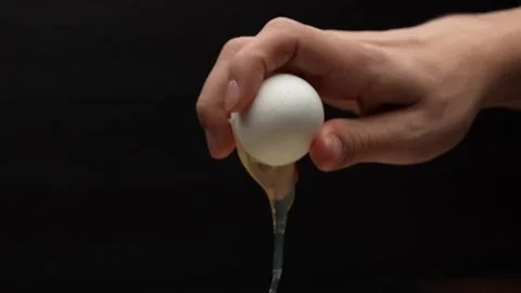 Cracking An Egg Stock Footage 154759495
