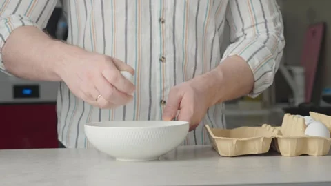 Cracking an egg Stock Footage 271616474