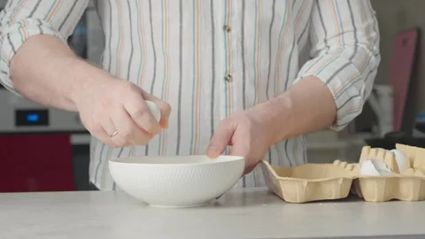 Cracking an egg Stock Footage 271616483