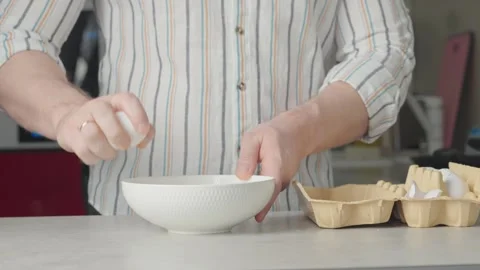 Cracking an egg Stock Footage 271616490