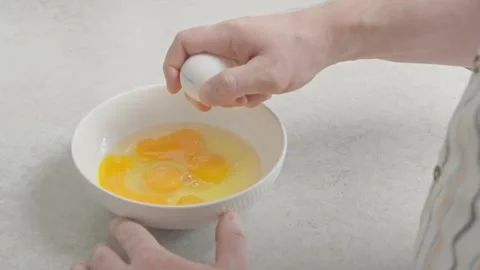 Cracking an egg Stock Footage 271616511