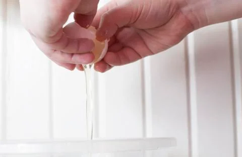 Cracking an Egg Stock Photos