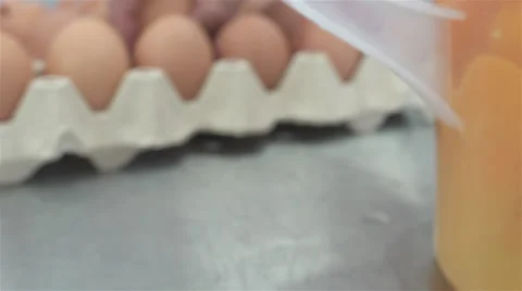 Cracking eggs in bakery. 스톡 동영상 68490875