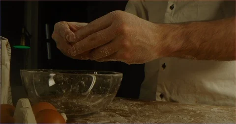 Cracking eggs in bowl macro shot 스톡 동영상 126299726