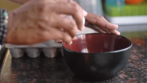 Cracking Eggs Stock Footage 166598458