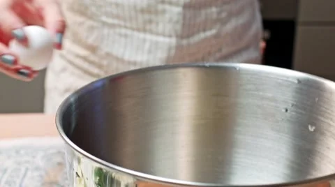 Cracking eggs, making dough Stock Footage 68017140