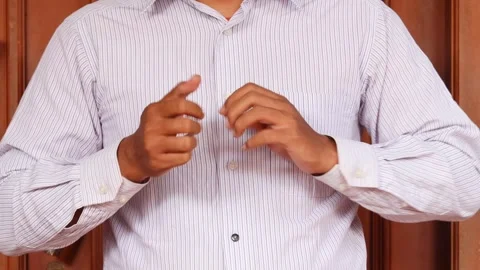 Cracking his finger knuckles or joints for a sense of relief Stock-Footage 345702901