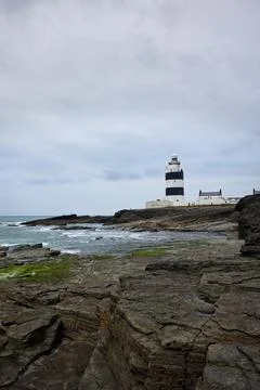 Cracking image of hook lighthouse in peninsula Wexford, Ireland. Stock Photos