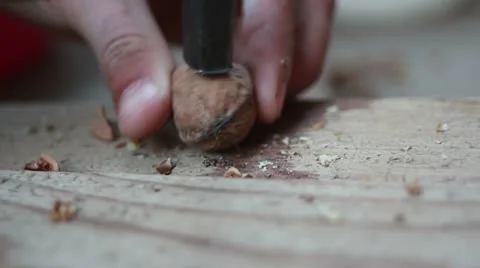 Cracking nuts board 1 Stock Footage 12657300