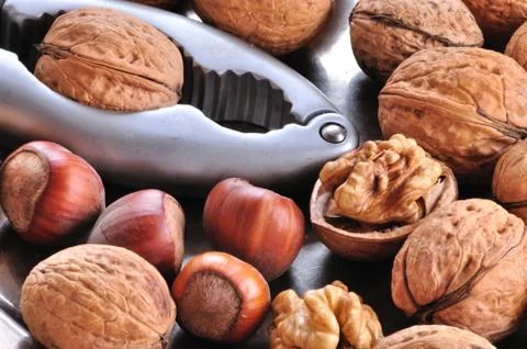 Cracking nuts Stock Photos