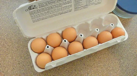 Cracking Organic Eggs Stock Footage 978246