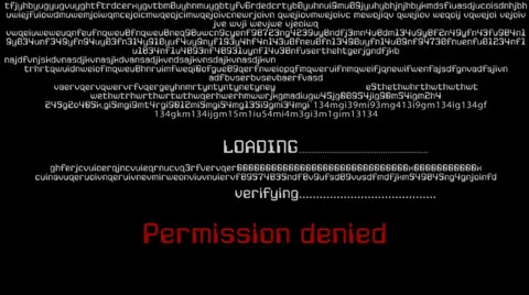 Cracking a Password by a Hacker Writing Code Stock Footage 24808375