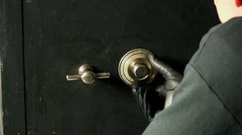 Cracking the safe; 6 Stock Footage 10774301