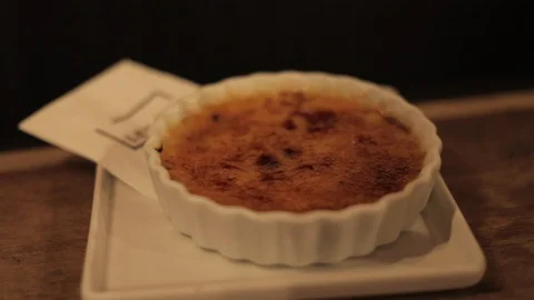 Cracking Sugar Crust of Creme Brulee Stock Footage 129338237