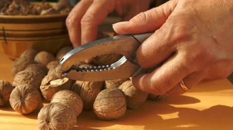 Cracking walnuts 스톡 동영상 11852962