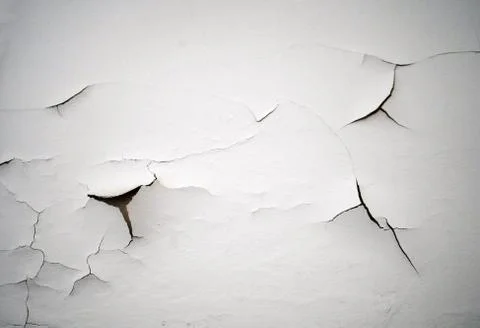 Cracking white paint on a wall 写真素材