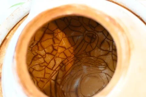 Crackle-glazed teapot interior Stock Photos