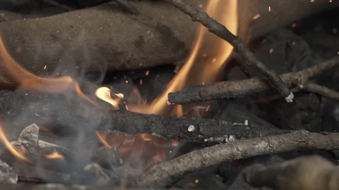 Crackling Fire Being Blown on Video stock 120132323