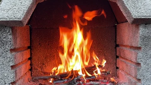 Crackling fire burning in brick fireplace. Stock Footage 342708668