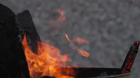 Crackling Flames and Glowing Frames in Slow Burning Wood Stock Footage 345183571