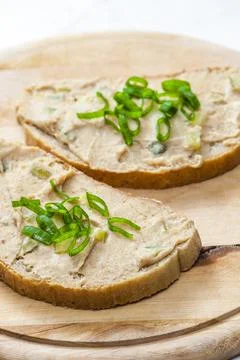 Cracklings spread on bread with spring onion Stock Photos