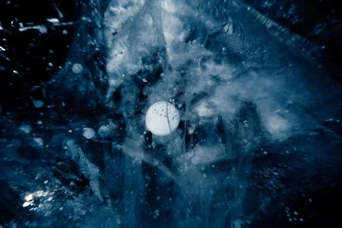 Cracks and bubbles in the ice of Lake Baikal 写真素材