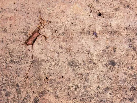 Cracks and marks on rustic clay floor tiles Stock Photos