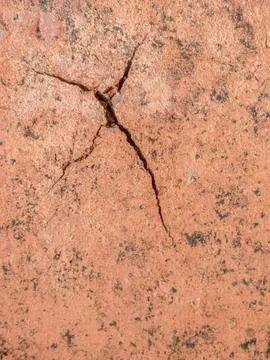Cracks and marks on rustic clay floor tiles 스톡 사진