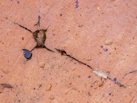 Cracks and marks on rustic clay floor tiles Stock Photos